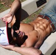 Sunning his abs