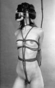 Tied, panel gagged and blindfolded