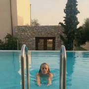Lucy Rose Jones with a subtle bounce and stretch coming out of the pool