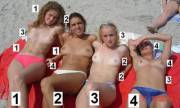 2 topless girls on the beach, ranked for Face, tits, body, and overall.