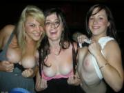 Three girls flashing their tits