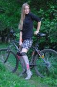 Schoolgirl hotty on a bike in the woods (24 pics)