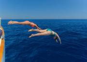 Two girls diving