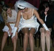 Bride tells women at her wedding to close their legs, accidentally provides her own wedding dress pantyhosed upskirt