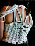 Tried the slip knot rope corset from http://formysir.com/RopeCorsets.pdf