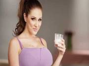 Lucy Pinder drinking milk