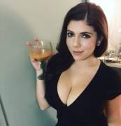 Emily raising her glass