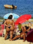 2 ladies looking relaxed on the beach