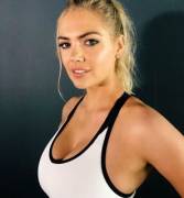 Kate Upton is ready to pleasure a cock under her sports bra