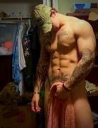 Ripped tattooed military man