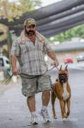 Hottie walking his pooch.