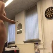 Stella Cox throwing darts