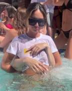 Grabbing her friends tits in the pool