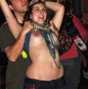 Shows boobs for beads [pic]