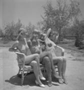 Three girls sitting.