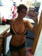 Nice smile with a rasta-kini.