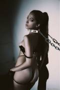 Jenna Haze in a collar and leash