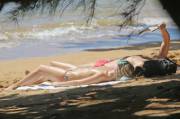Margot Robbie sunbathing topless