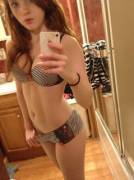 Busty redhead in panties