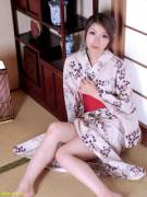 Beautiful Japanese milf wearing kimono robe.