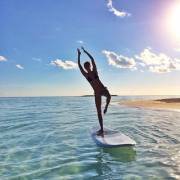 Gisele trying to do yoga on board