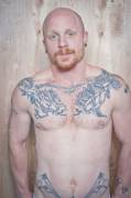 Tatts, bald, beard, ginge. Perfect.